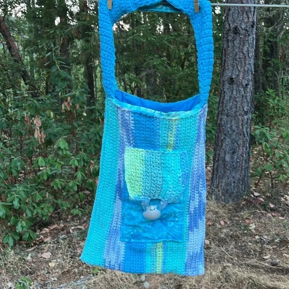 Handmade crochet bag with shell pocket and batik beautiful colors